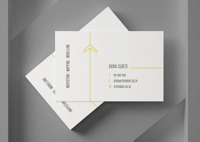 step above business card design